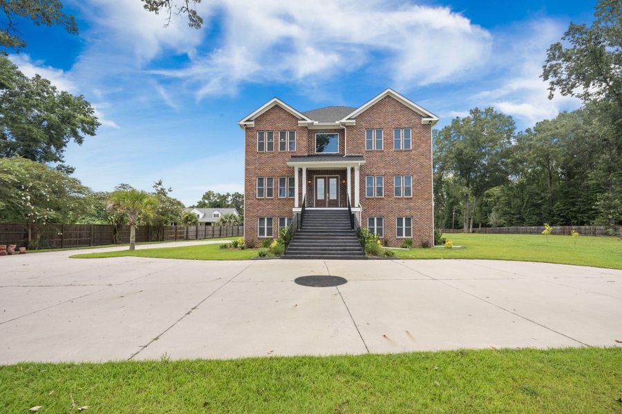 Front exterior of a new home in , Summerville, SC, highlighting curb appeal (Image 27). Front exterior of a new home in , Summerville, SC, highlighting curb appeal (Image 27).