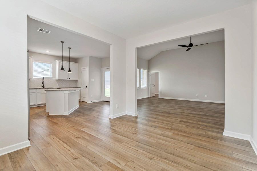 The dining room is perfectly fitted adjacent to the kitchen and living room.