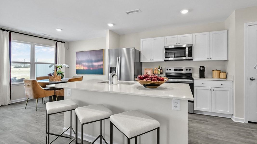 Furnished interior view inside a new home in North Village Townes, Greensboro (Image 6).