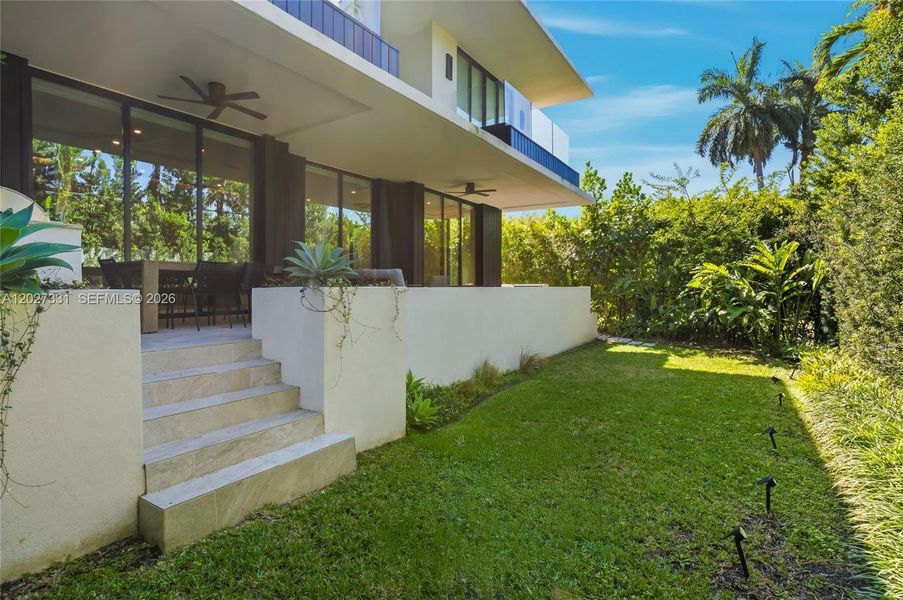 Exterior details and patio area of a home in , Miami Beach (Image 29). Exterior details and patio area of a home in , Miami Beach (Image 29).