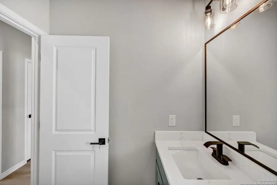 Furnished interior view inside a new home in , Elmendorf (Image 5).