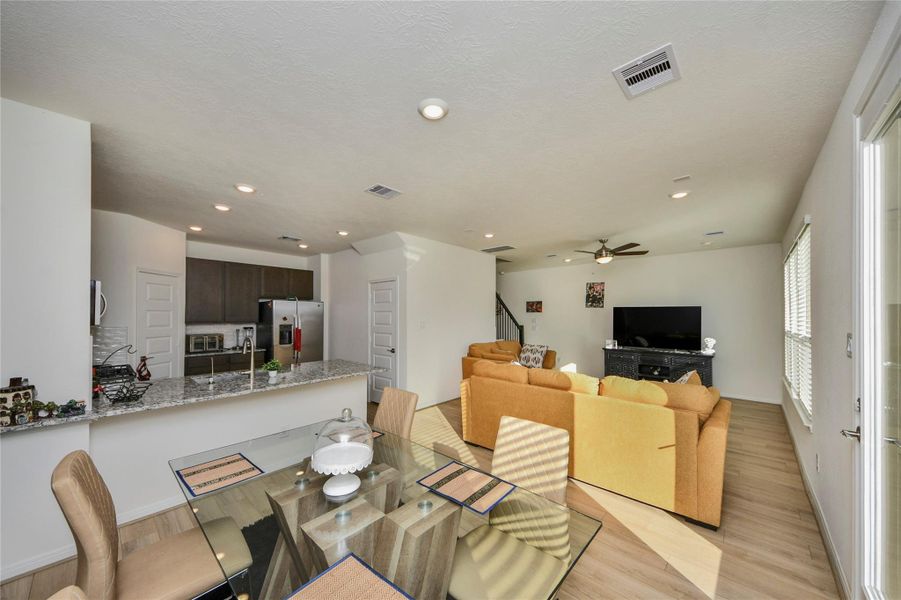 Furnished interior view inside a new home in Sunterra North, Katy (Image 33).