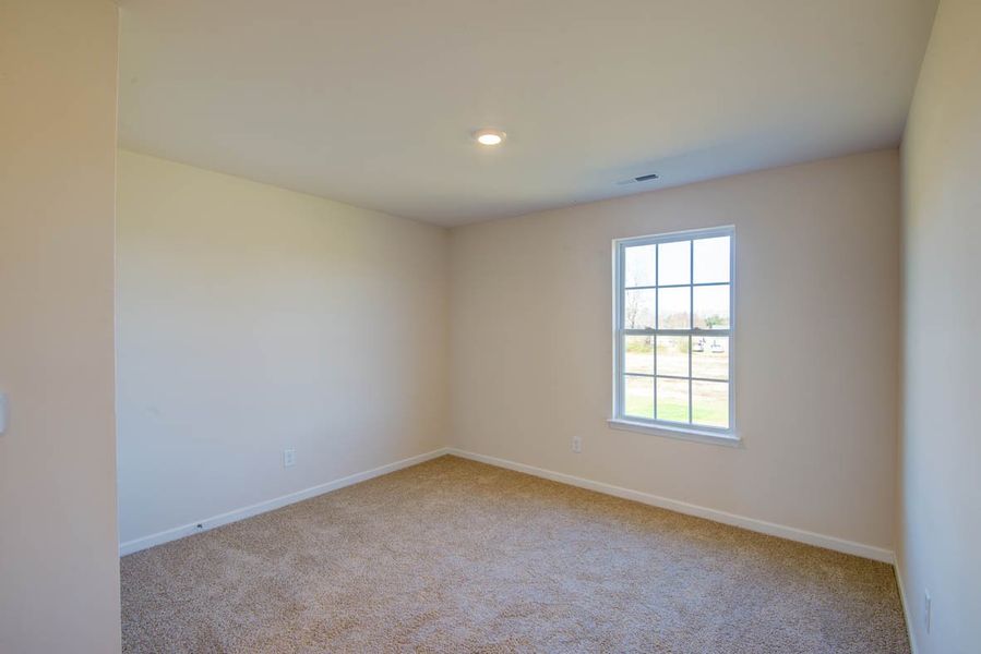 Representative unfurnished interior of a home built from the Penwell by D.R. Horton in Carter Ridge, Greenville (Image 19).