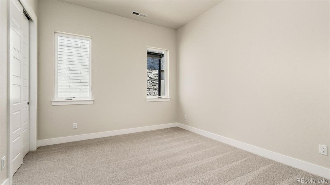 Spacious, unfurnished interior of a new home in Pelican Shores at Water Valley, Windsor (Image 13).