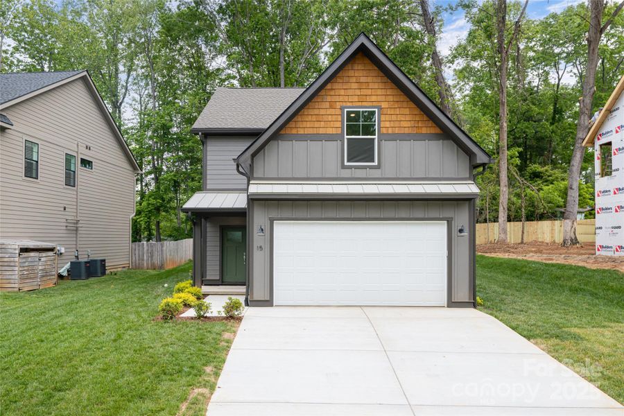Front exterior of a new home in , Arden, NC, highlighting curb appeal (Image 27). Front exterior of a new home in , Arden, NC, highlighting curb appeal (Image 27).