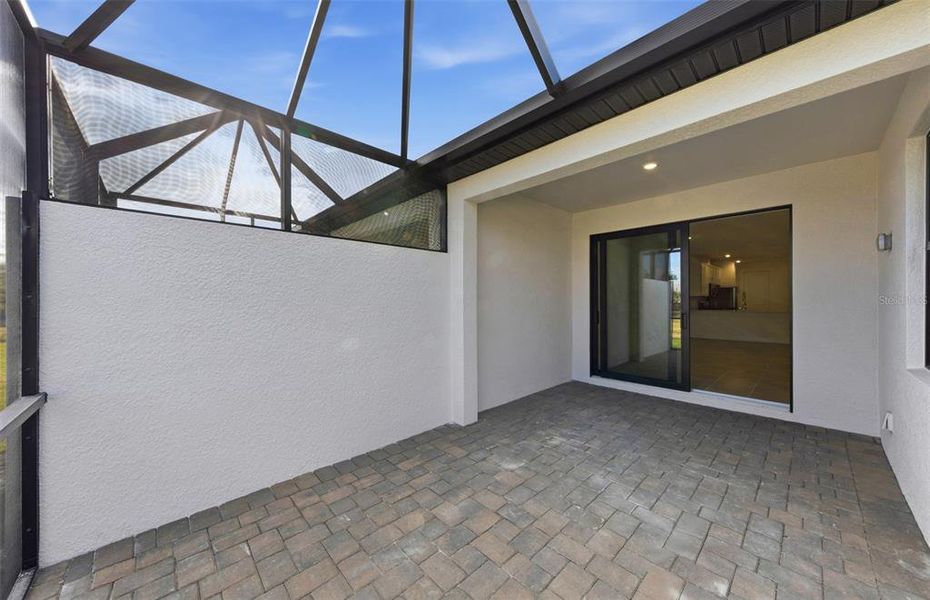 Exterior details and patio area of a home in Talon Preserve on Palmer Ranch, Nokomis (Image 29).