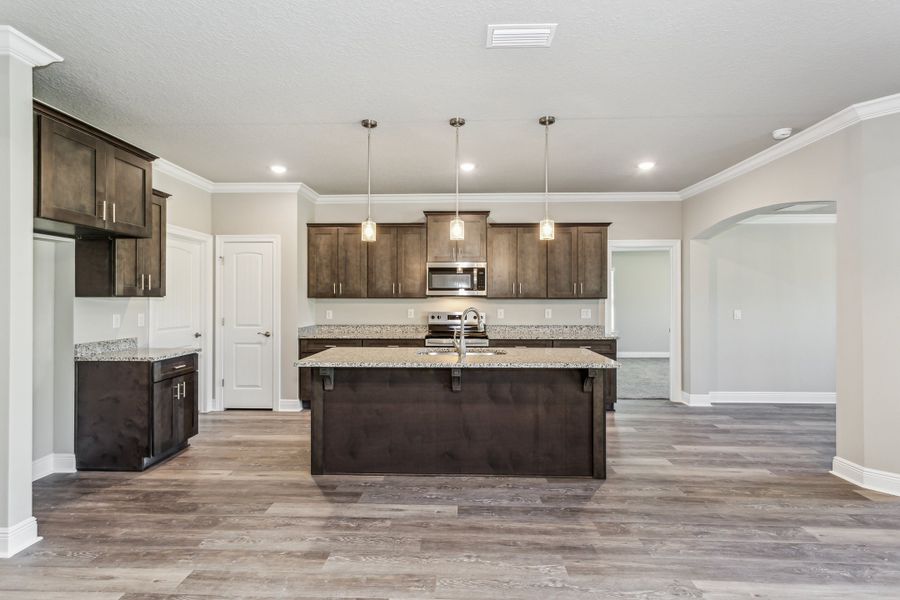 Representative furnished interior of a home built from the The Sapphire by Herbst Homes in Clear Water Landing, Milton (Image 56).