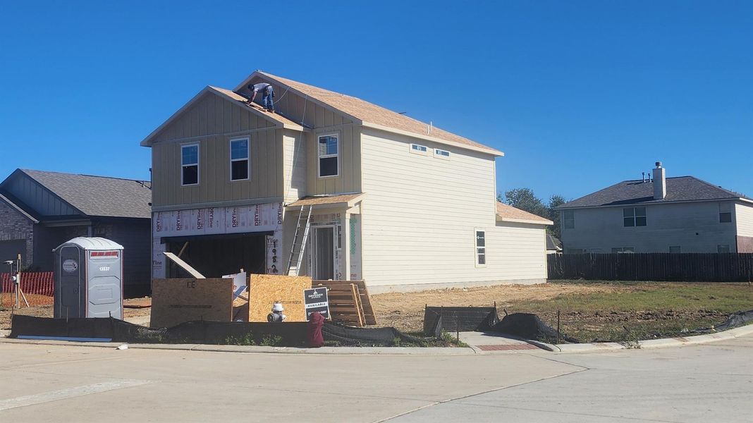 Front exterior of a new home in The Villages at WestPointe, Dayton, TX, highlighting curb appeal (Image 1). Front exterior of a new home in The Villages at WestPointe, Dayton, TX, highlighting curb appeal (Image 1).