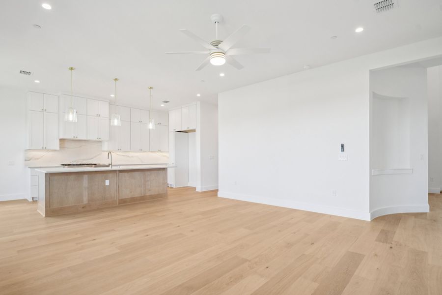 Spacious, unfurnished interior of a new home in Milky Way at River Place, Austin (Image 43).
