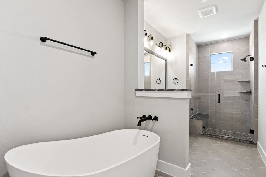 Furnished interior view inside a new home in The Tribute, The Colony (Image 19).