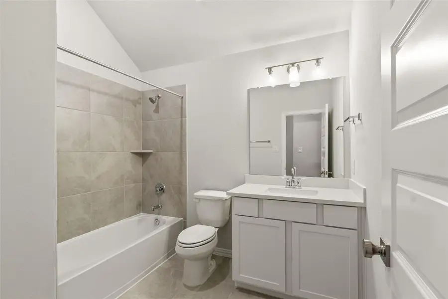 Furnished interior view inside a new home in Sunterra, Katy (Image 5).