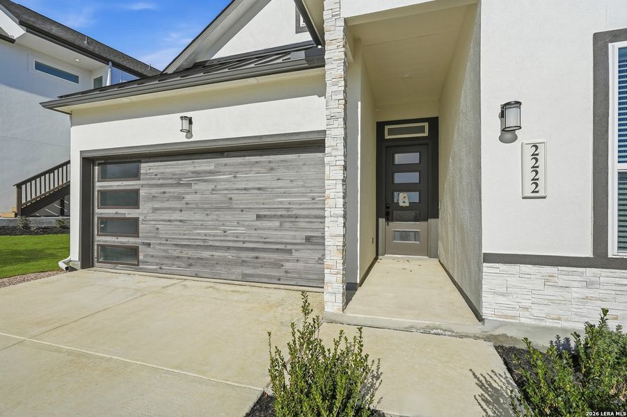 Exterior details and patio area of a home in Prominence, San Antonio (Image 3).
