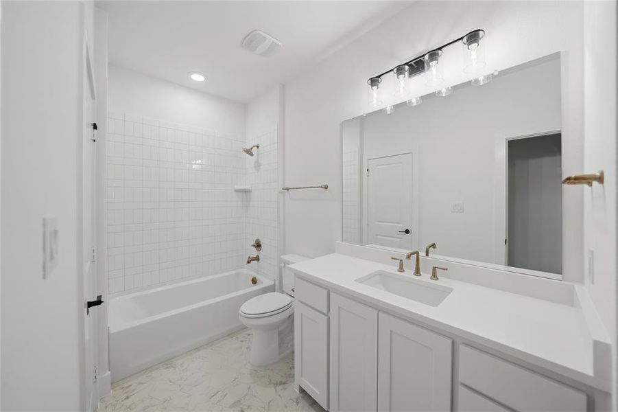 Furnished interior view inside a new home in Light Farms Graham/Reagan, Celina (Image 17).