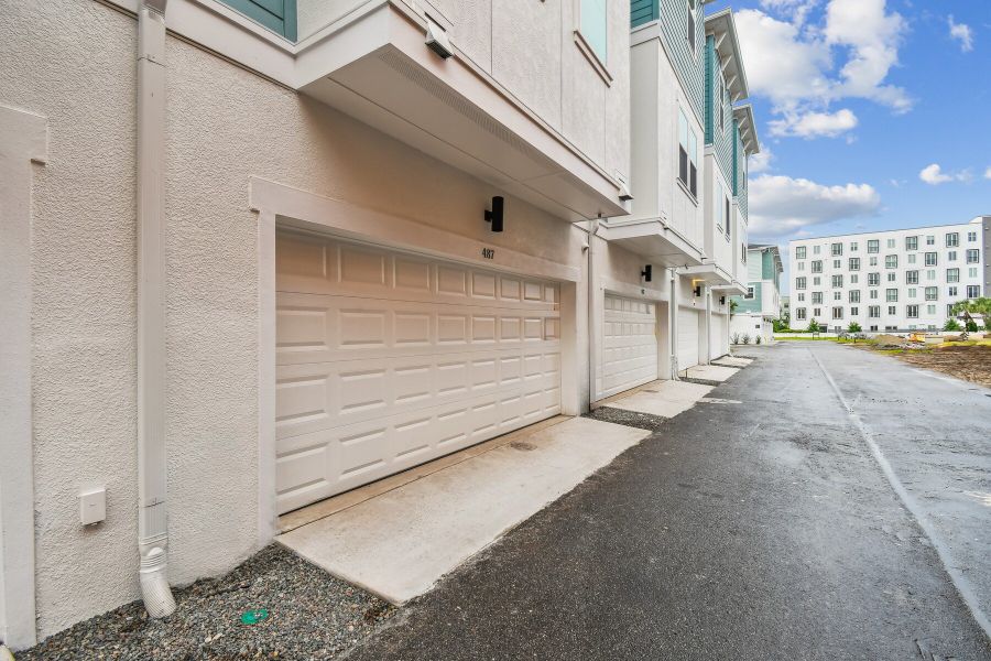 Exterior details and patio area of a home in Towns at Union, St. Petersburg (Image 29).