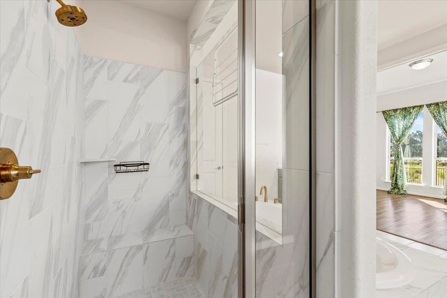 Full bathroom featuring a marble finish shower Full bathroom featuring a marble finish shower