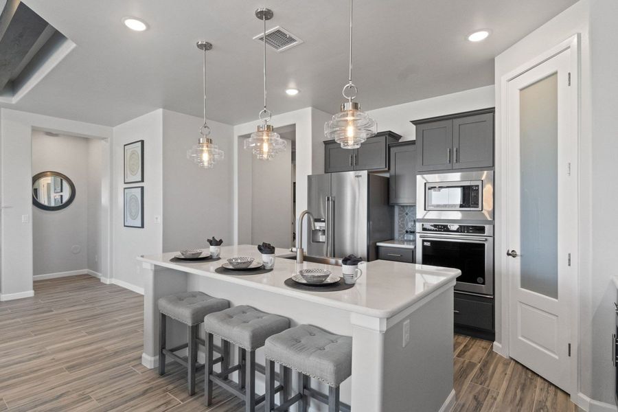 Representative furnished interior of a home built from the Valencia by Hakes Brothers in Hillside Park, El Paso (Image 6).