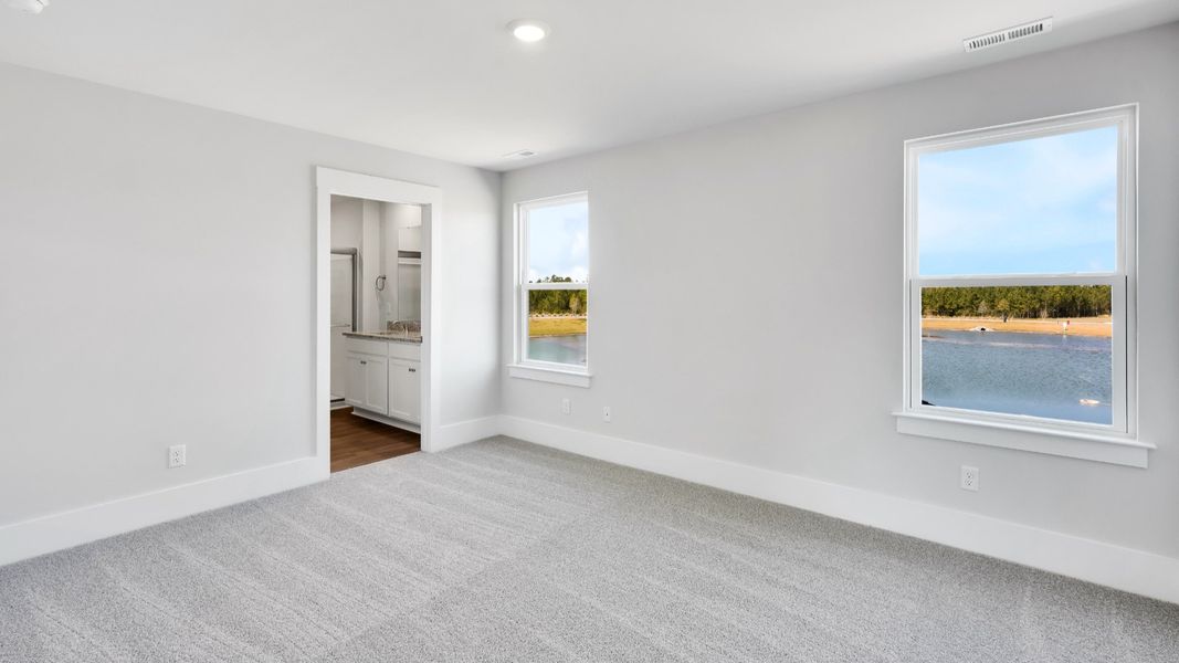 Spacious, unfurnished interior of a new home in The Pines at Blake Farm, Wilmington (Image 20).