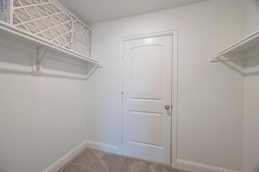 Secondary bedroom walk in closet - View