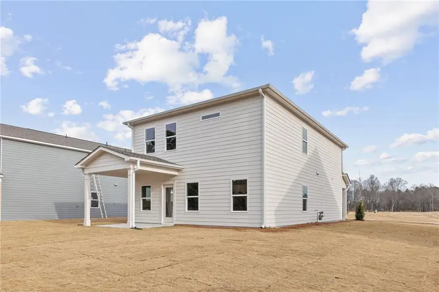 Exterior details and patio area of a home in The Bluffs, Canton (Image 21). Exterior details and patio area of a home in The Bluffs, Canton (Image 21).