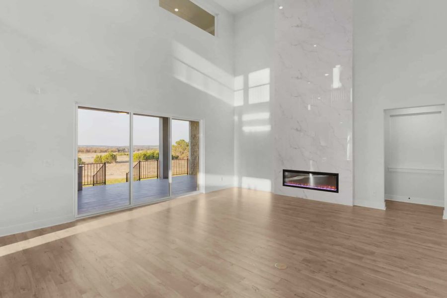 Representative unfurnished interior of a home built from the Merritt by Chesmar Homes in Feathergrass, Fulshear (Image 9).