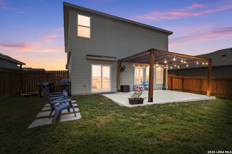Exterior details and patio area of a home in Legend Pond, New Braunfels (Image 24).