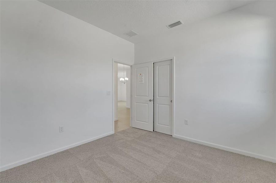 Spacious, unfurnished interior of a new home in Willowbrook North, Winter Haven (Image 27).