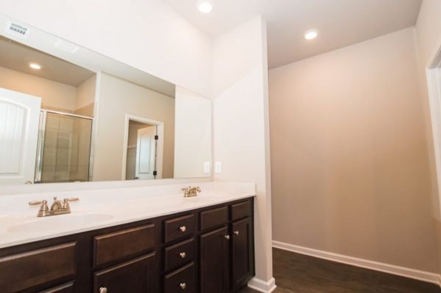 Representative furnished interior of a home built from the Cadence Unit A by Piedmont Residential in Ross Pointe, Kennesaw (Image 8).