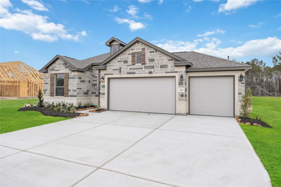 Front exterior of a new home in Barton Place, Cleveland, TX, highlighting curb appeal (Image 18).