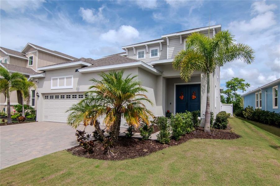 Front exterior of a new home in , Apollo Beach, FL, highlighting curb appeal (Image 27). Front exterior of a new home in , Apollo Beach, FL, highlighting curb appeal (Image 27).