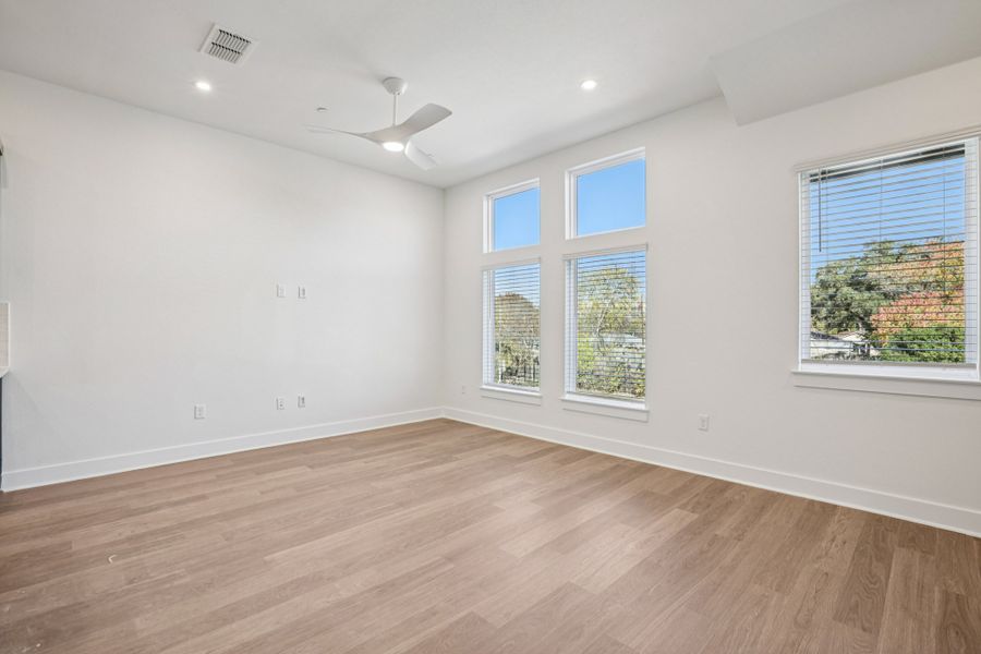 Spacious, unfurnished interior of a new home in Koenig Townhomes, Austin (Image 20).