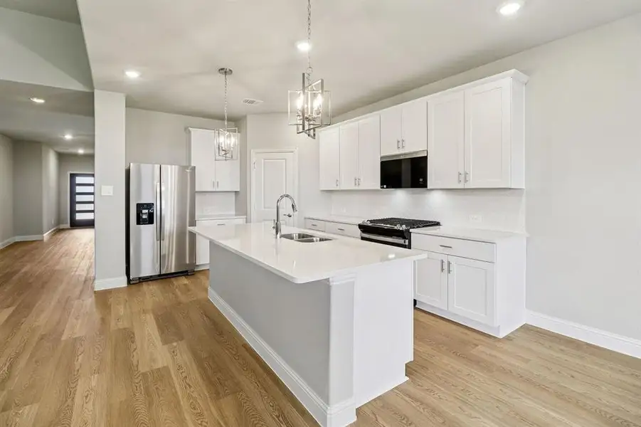 Furnished interior view inside a new home in Lakehaven - Premier Series, Farmersville (Image 7).