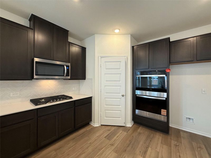 Furnished interior view inside a new home in River Bluff, Leander (Image 11). Furnished interior view inside a new home in River Bluff, Leander (Image 11).