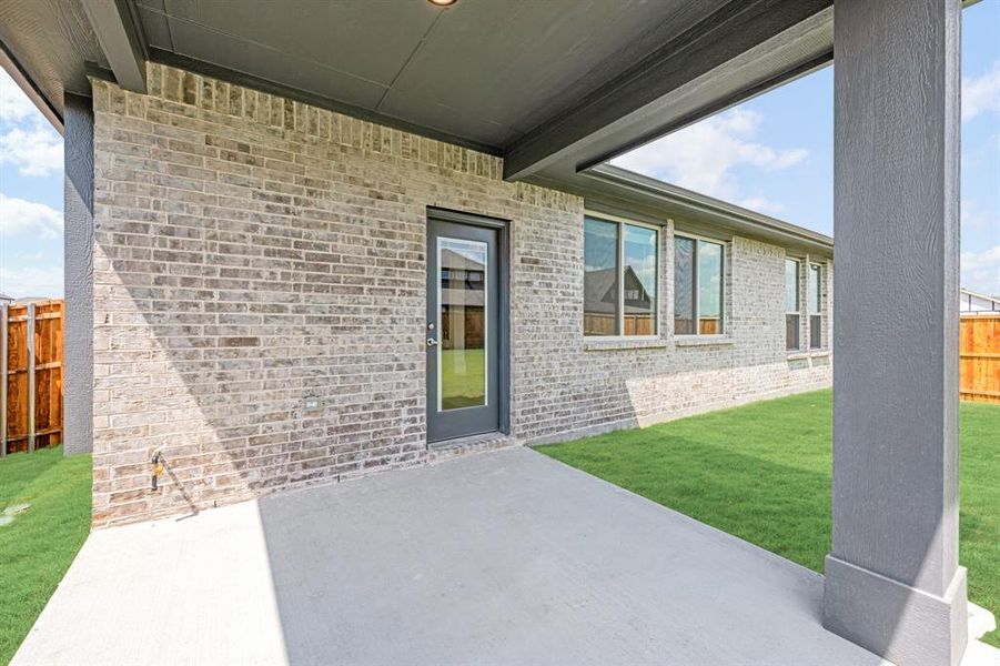 Exterior details and patio area of a home in ArrowBrooke Elements, Aubrey (Image 27). Exterior details and patio area of a home in ArrowBrooke Elements, Aubrey (Image 27).