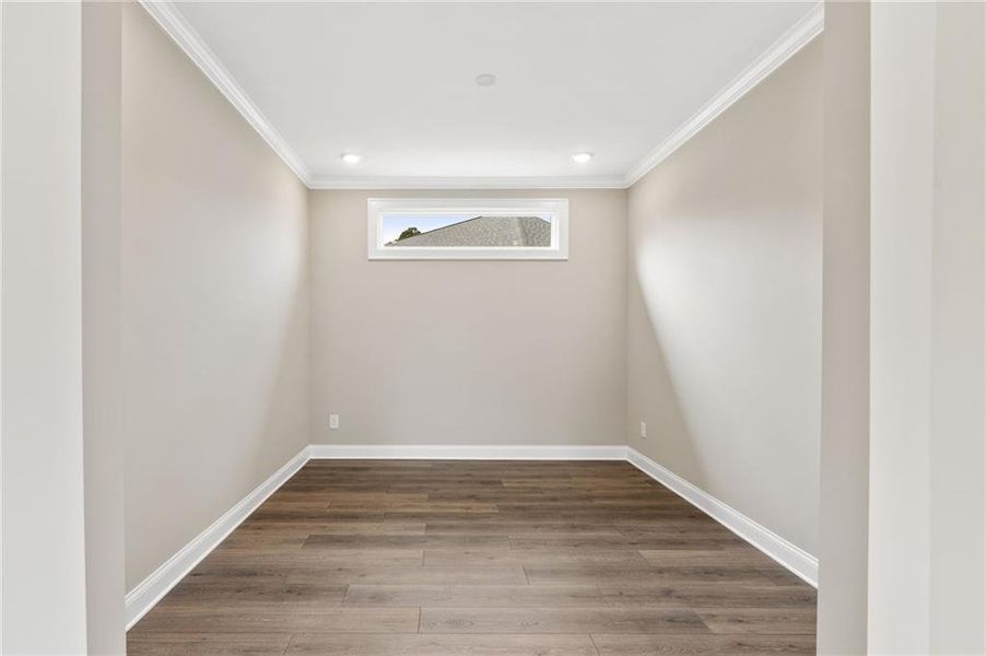 Spacious, unfurnished interior of a new home in The Courtyards at Bailey Farm, Dacula (Image 25).