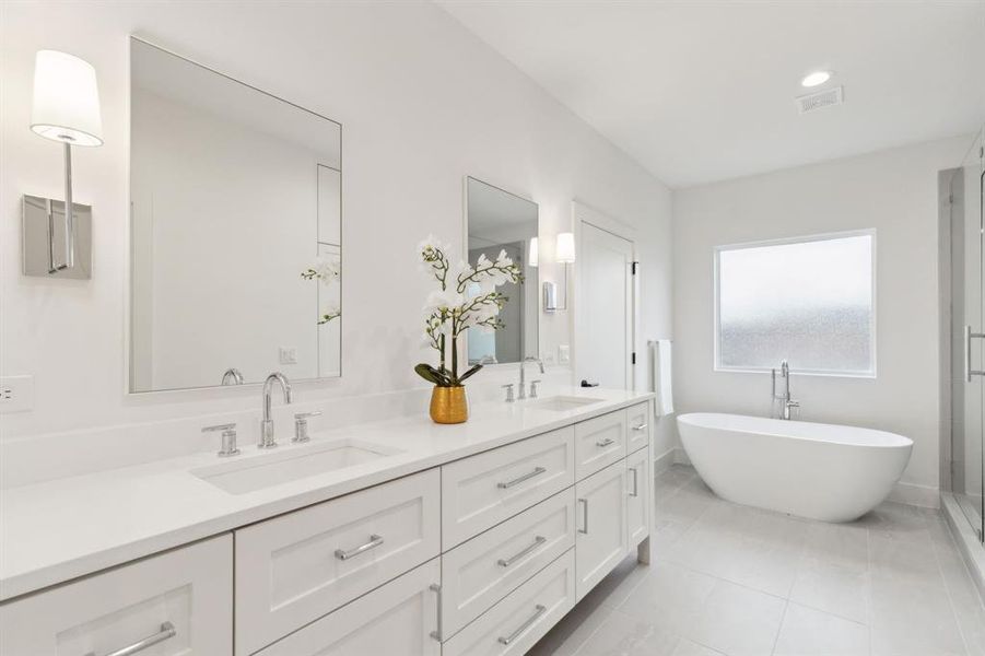 Bathroom with separate shower and tub, tile patterned flooring, and vanity