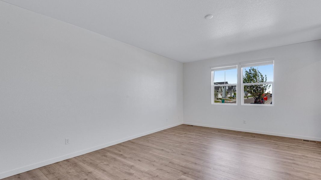 Spacious, unfurnished interior of a new home in Sky Ranch, Watkins (Image 11).
