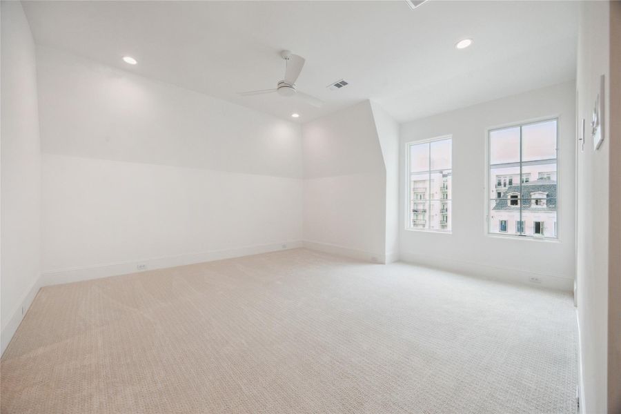 The third floor features this expansive bedroom with oversized walk-in closet and en-suite bathroom. The third floor features this expansive bedroom with oversized walk-in closet and en-suite bathroom.