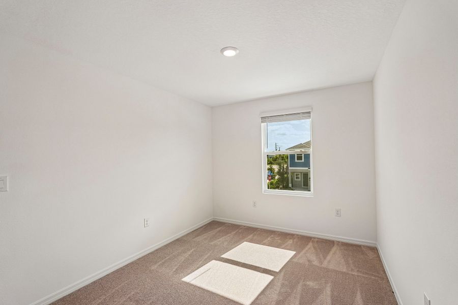 Spacious, unfurnished interior of a new home in The Towns at Tiburon, Nokomis (Image 12).