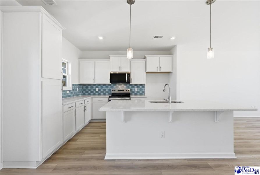 Furnished interior view inside a new home in Spring Haven, Florence (Image 9).