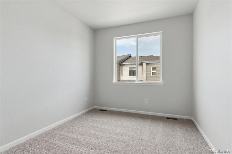 Spacious, unfurnished interior of a new home in Townhome Collection at Grand Vue at Interlocken, Broomfield (Image 14).