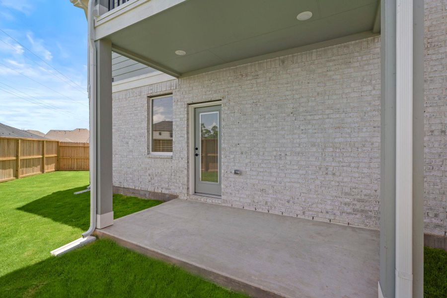 Front exterior of a new home in Sienna, Missouri City, TX, highlighting curb appeal (Image 2). Front exterior of a new home in Sienna, Missouri City, TX, highlighting curb appeal (Image 2).