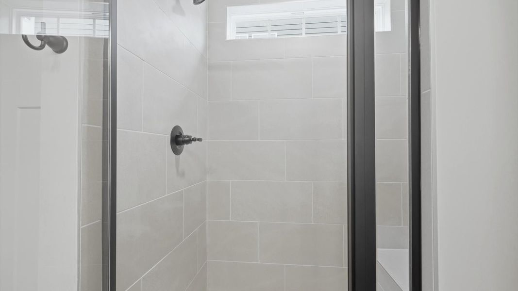 Exceptional en-suite with a spacious walk-in shower for superior everyday comfort at Creeks at Midway
