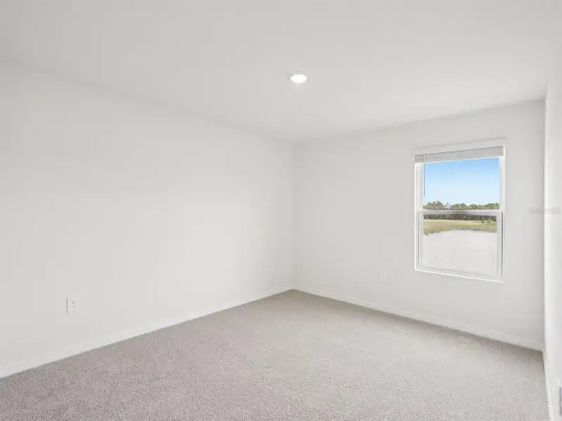 Spacious, unfurnished interior of a new home in Magnolia Bay - Classic Series, Nokomis (Image 9).