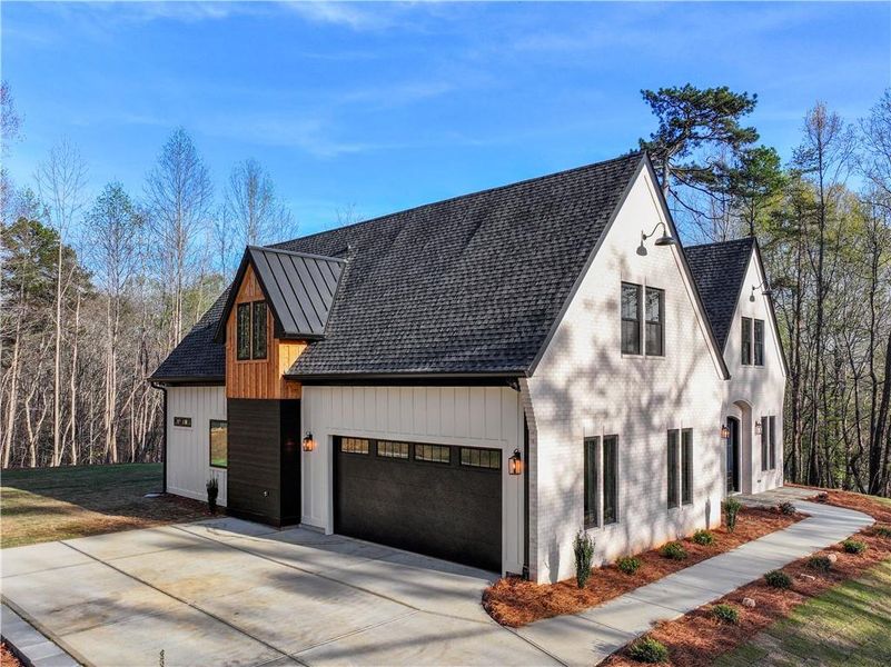 Front exterior of a new home in , Gainesville, GA, highlighting curb appeal (Image 35).