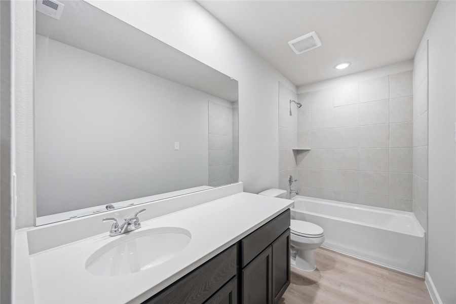 Furnished interior view inside a new home in Bluebonnet Village, Bellville (Image 15). Furnished interior view inside a new home in Bluebonnet Village, Bellville (Image 15).