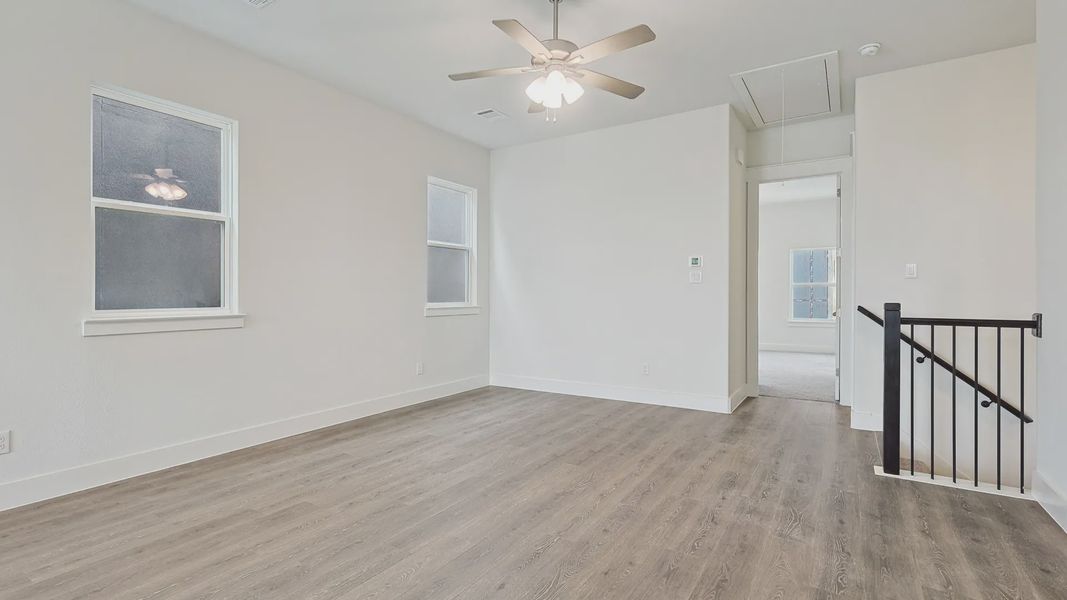 Furnished interior view inside a new home in Collin Creek, Plano (Image 14).