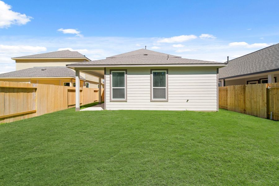 Exterior details and patio area of a home in Cypresswood Landing, Humble (Image 4).