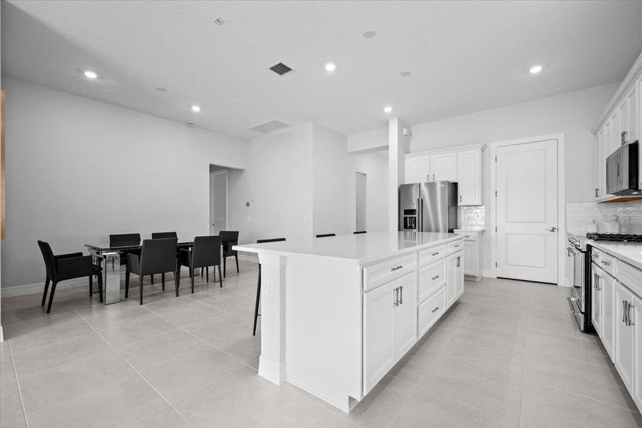 Furnished interior view inside a new home in Avondale at Avenir, Palm Beach Gardens (Image 13).