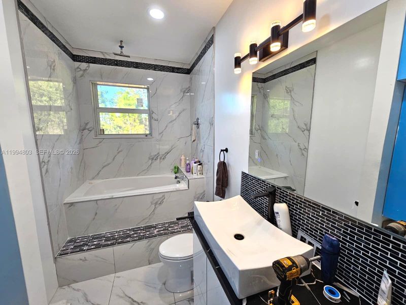 Furnished interior view inside a new home in , Clewiston (Image 4).