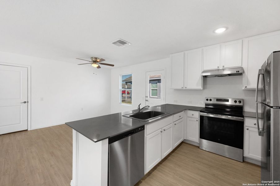 Furnished interior view inside a new home in , San Antonio (Image 8).